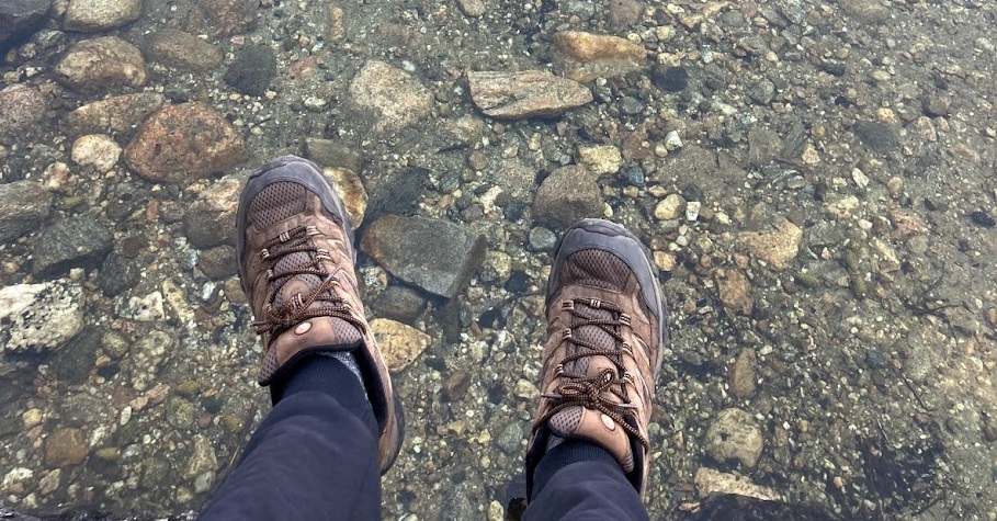 shoes and a lake